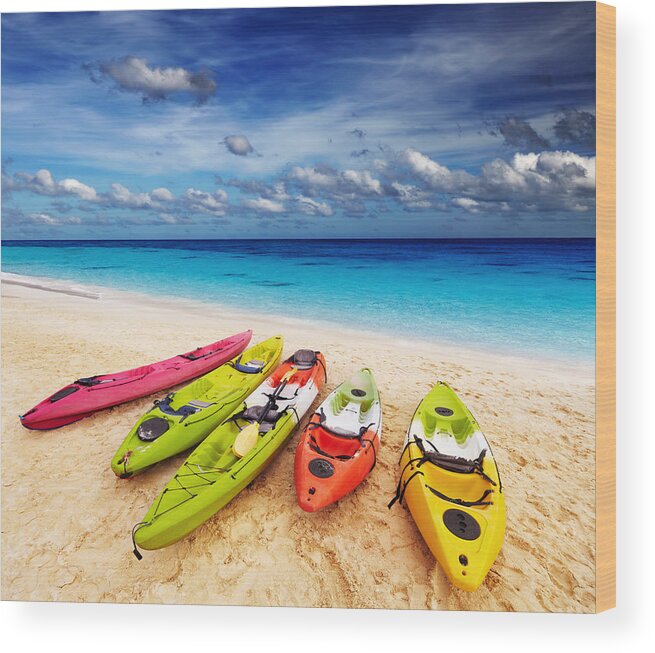 Landscape Wood Print featuring the photograph Colorful Kayaks On The Tropical Beach by DPK-Photo