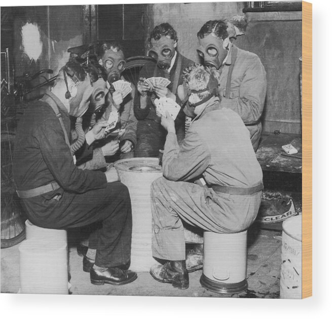 Young Men Wood Print featuring the photograph Group Of Men Playing Cards, Wearing Gas by Fpg
