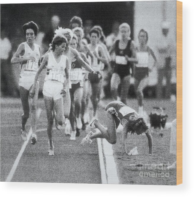 1980-1989 Wood Print featuring the photograph Mary Decker Falling In 3000 Meter Race by Bettmann