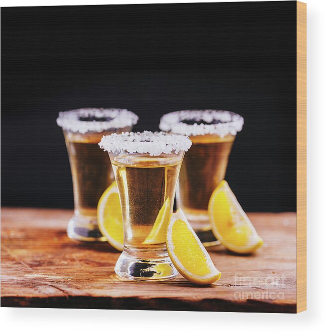 Tequila Wood Print featuring the photograph Tree shot glasses of Mexican tequila cocktail with lemon slices by Jelena Jovanovic