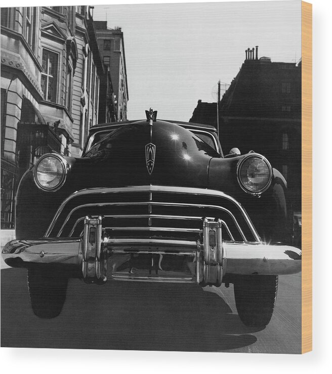 Oldsmobile Wood Print featuring the photograph An Oldsmobile Car #1 by Constantin Joffe