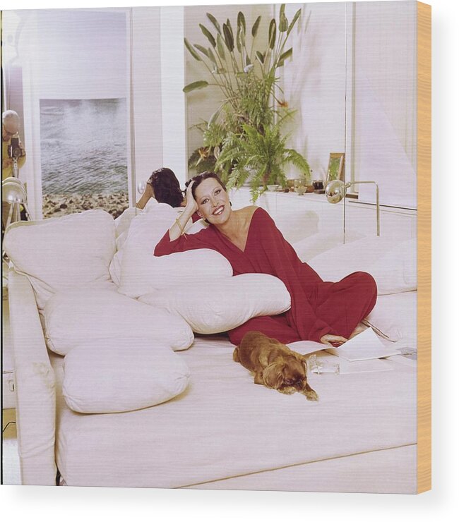 Dog Wood Print featuring the photograph Elsa Peretti Wearing Halston Pajamas by Horst P. Horst