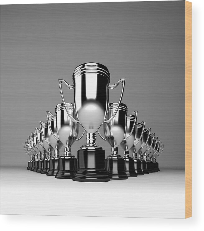 In A Row Wood Print featuring the photograph Trophy Cups In A Row #1 by Doug Armand