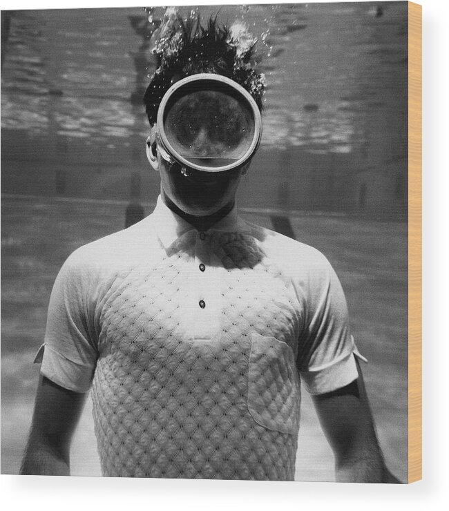 Model Wood Print featuring the photograph A Male Model Underwater In A Pool With A Scuba by Leonard Nones