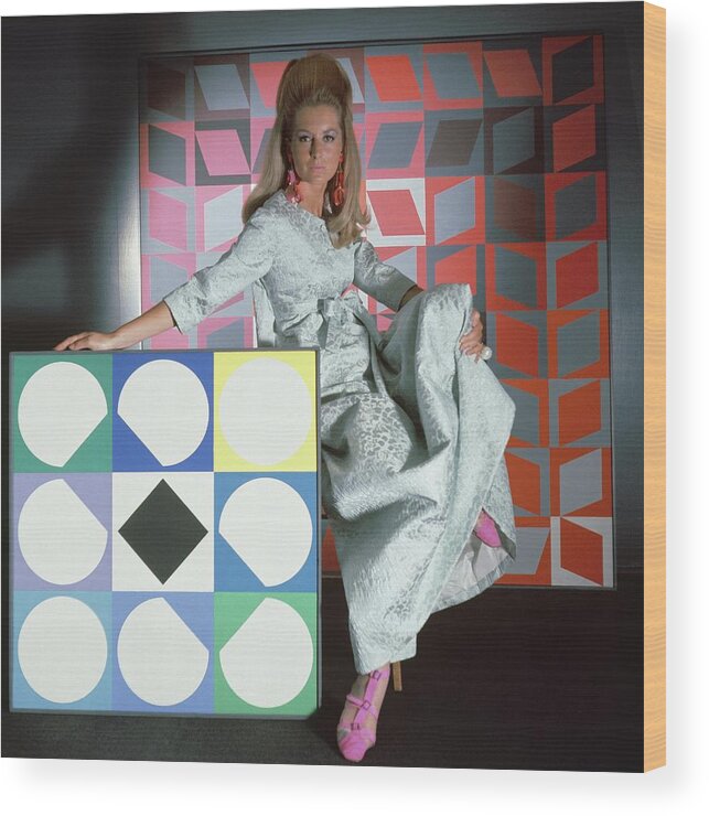 Mod Wood Print featuring the photograph A Model Wearing A Stella Robe With Vasarely by Horst P. Horst