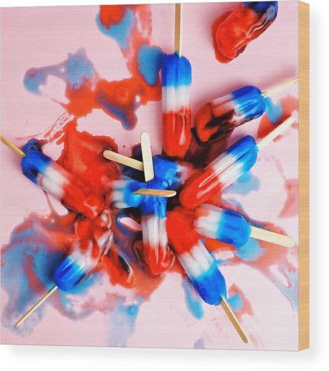 Melting Wood Print featuring the photograph A Pile Of Red, White, And Blue Ice Pops by Juj Winn
