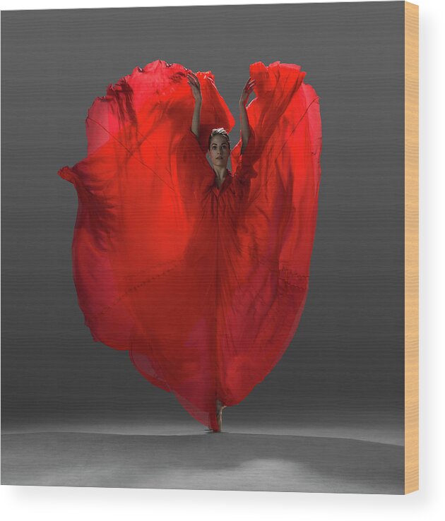 Ballet Dancer Wood Print featuring the photograph Ballerina On Pointe With Red Dress by Nisian Hughes