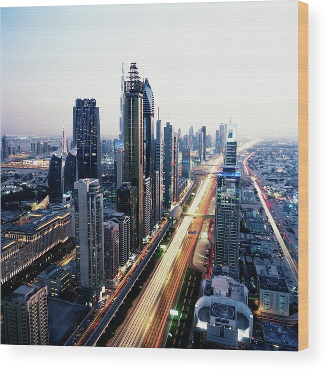 Tranquility Wood Print featuring the photograph Elevated View Of Sheikh Zayed Road And by Gary Yeowell