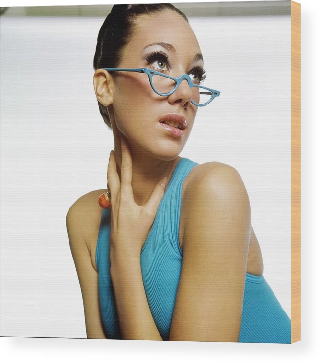 Accessories Wood Print featuring the photograph Marisa Berenson Wearing Blue Glasses by Bert Stern
