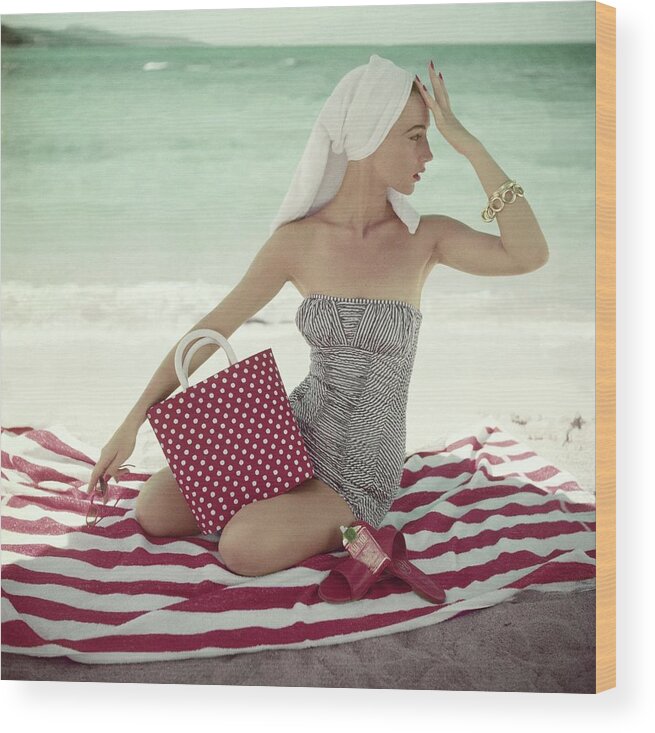 Fashion Wood Print featuring the photograph Model With A Polka Dot Bag On A Beach by Roger Prigent