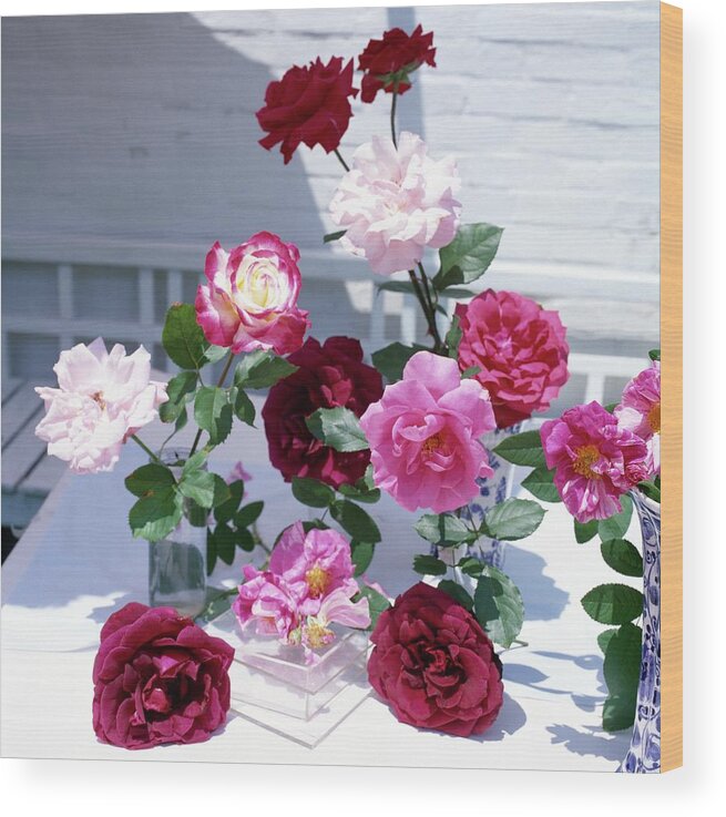 Outdoors Wood Print featuring the photograph Roses In Vases by Horst P. Horst