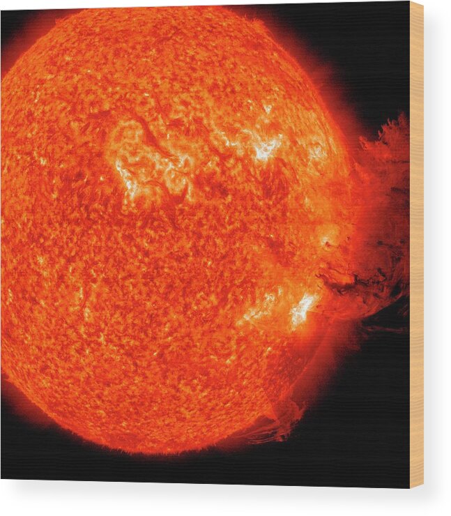 Sun Wood Print featuring the photograph Solar Flare by Nasa/sdo/science Photo Library