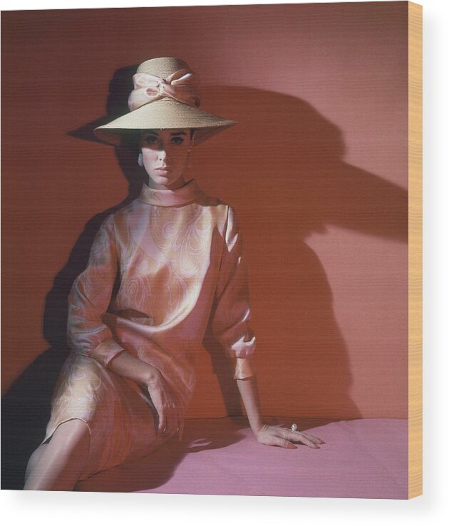 Studio Shot Wood Print featuring the photograph Sondra Peterson Wearing Pink Ensemble With Straw by Horst P. Horst