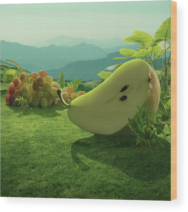 Giant Wood Print featuring the photograph Surreal Giant Pear And Grapes At by Vizerskaya