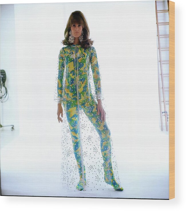 Fashion Wood Print featuring the photograph Vanessa Redgrave Wearing A Transparent Coat by Bert Stern