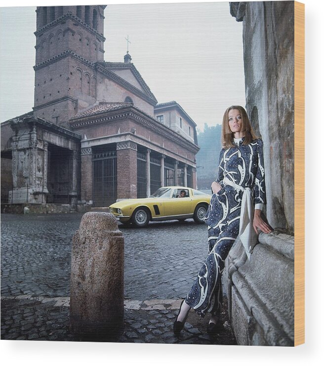 Fashion Wood Print featuring the photograph Veruschka Von Lehndorff Standing In Piazza Di San by Franco Rubartelli