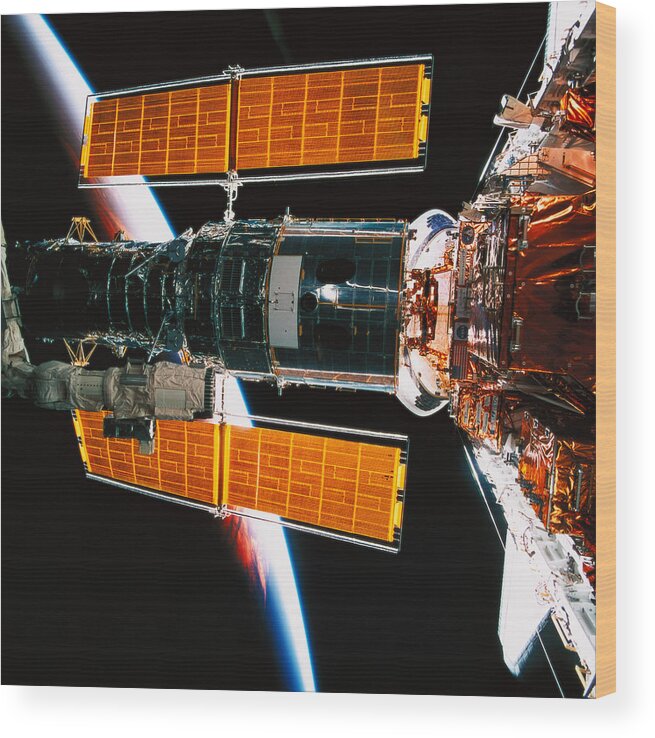 Square Wood Print featuring the photograph A Satellite Docked On The Space Shuttle #1 by Stockbyte