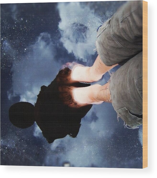 Reflection Wood Print featuring the photograph Reflection of boy in a puddle of water #1 by Matthias Hauser