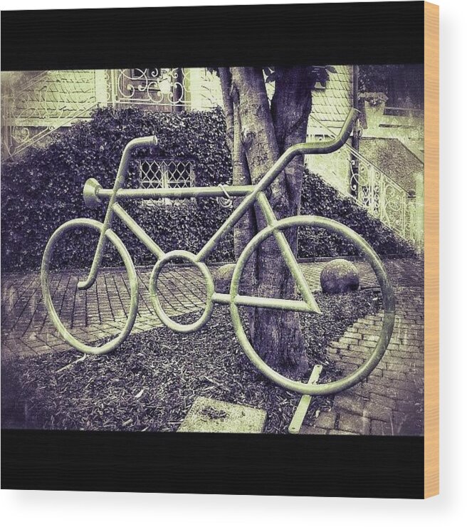 Steel Wood Print featuring the photograph A Bicycle statue In The City Made by Sascha Buchholz