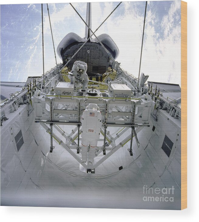 Sts-49 Endeavour Multipurpose Experiment Support Structure Wood Print featuring the photograph Assembling Structures In Endeavours by Nasa