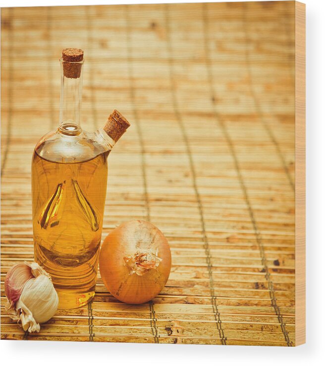 Bulb Wood Print featuring the photograph Olive oil by Tom Gowanlock