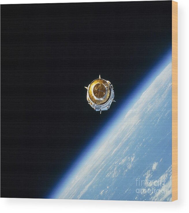 Color Image Wood Print featuring the photograph Satellite In Outer Space by Stocktrek Images