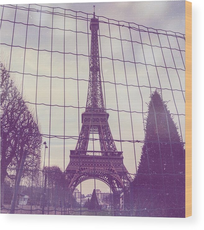Eiffel Wood Print featuring the photograph Eiffel Tower Through Fence by Aurella FollowMyFrench