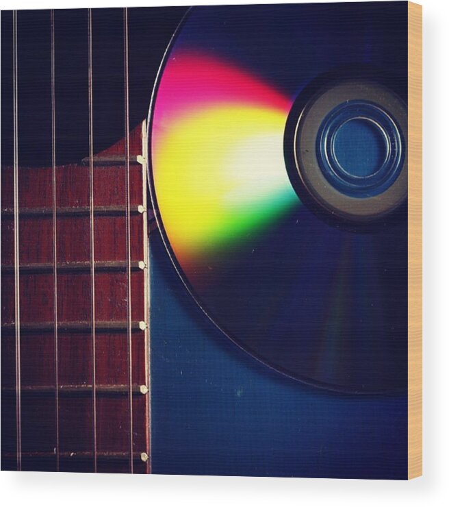  Wood Print featuring the photograph Guitar And Cd by Jun Pinzon