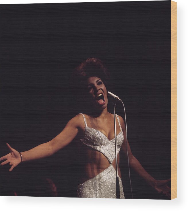 Singer Wood Print featuring the photograph Shirley Bassey Performs On Stage #1 by Tony Russell