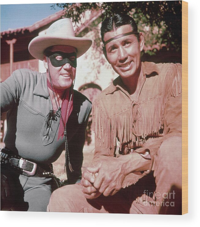 The Lone Ranger Wood Print featuring the photograph The Lone Ranger And Tonto #1 by Bettmann