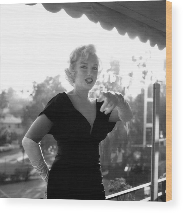 People Wood Print featuring the photograph Marilyn Monroe At The Beverly Hills #2 by Michael Ochs Archives