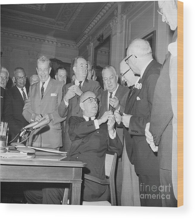 People Wood Print featuring the photograph President Johnson Signing Civil Rights #2 by Bettmann