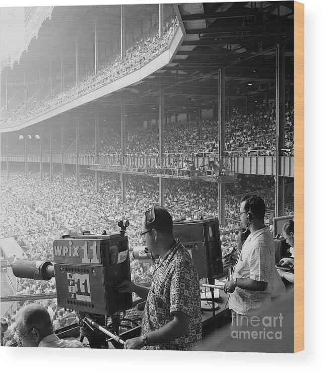 1950-1959 Wood Print featuring the photograph Cameraman Bob Rogow Left And Phil by New York Daily News Archive
