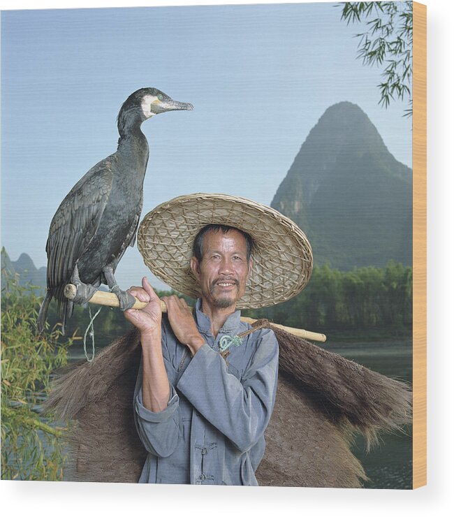 Chinese Culture Wood Print featuring the photograph Cormorant Fisherman Portrait by Martin Puddy