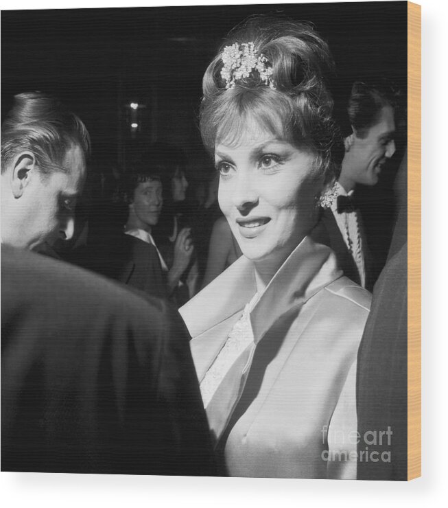 People Wood Print featuring the photograph Gina Lollobrigida Smiling At Guest by Bettmann