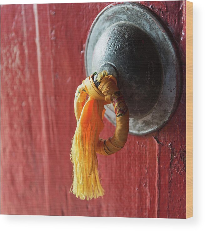 Chinese Culture Wood Print featuring the photograph Gold Tassel Tied To A Doorknob On A Red by Keith Levit / Design Pics