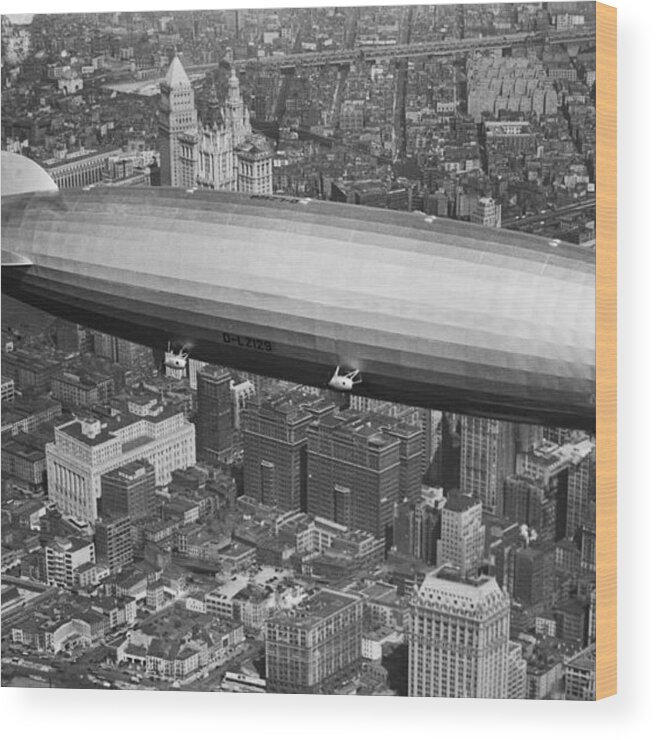 1930-1939 Wood Print featuring the photograph Hindenburg Hovering Over New York by Bettmann