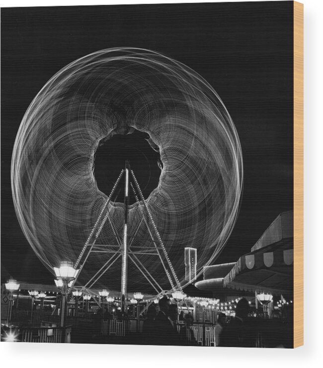 Long Wood Print featuring the photograph Light Ride by Hulton Archive