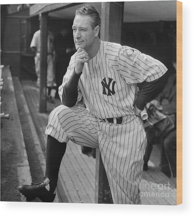 People Wood Print featuring the photograph Lou Gehrig Watching Game by Bettmann
