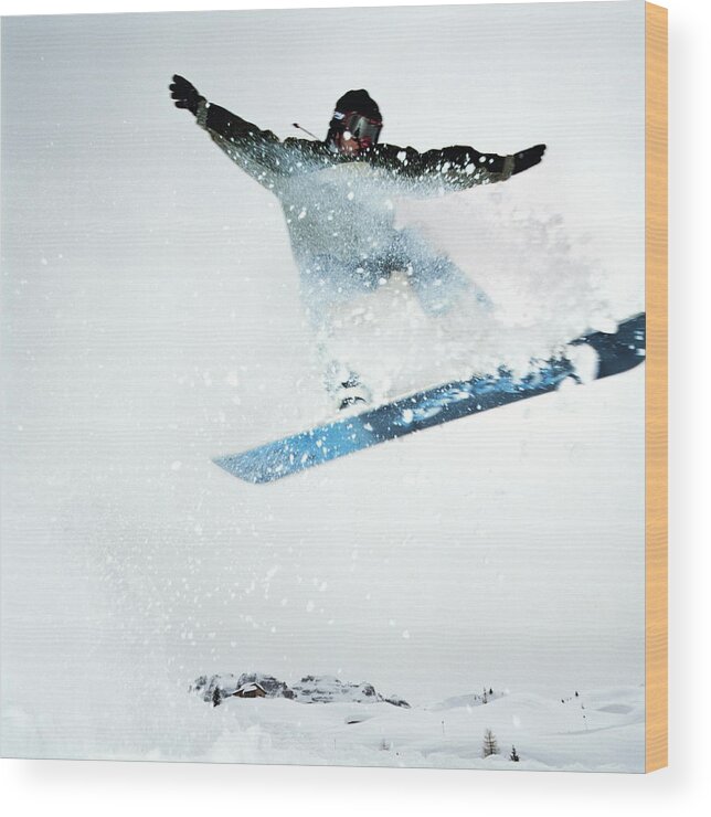 Human Arm Wood Print featuring the photograph Man Snowboarding, Mid-jump by Martin Barraud