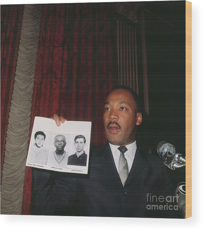 Following Wood Print featuring the photograph Martin Luther King Jr. Holding Photos by Bettmann