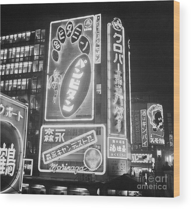 1950-1959 Wood Print featuring the photograph Neon Signs In Osaka by Bettmann