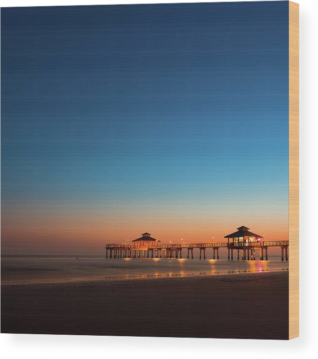 Water's Edge Wood Print featuring the photograph Pier Boardwalk At Twilight by Moreiso