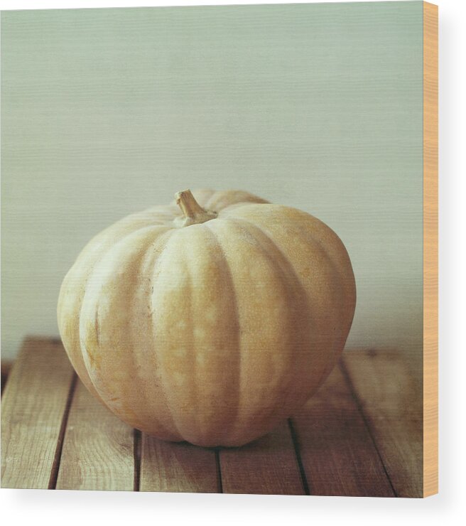 Wood Wood Print featuring the photograph Pumpkin On Wooden Table by Copyright Anna Nemoy(xaomena)