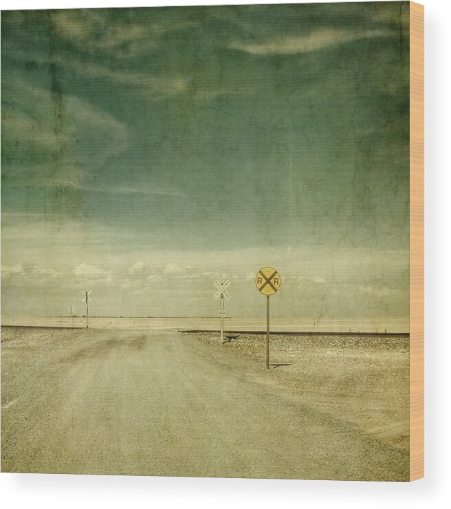 Railroad Track Wood Print featuring the photograph Railroad Crossing In Middle Of Texas by John Salisbury