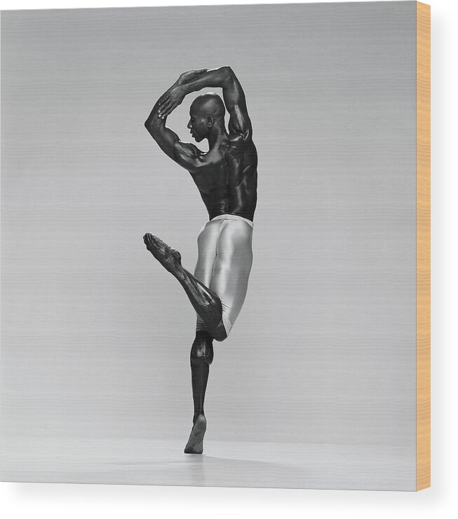 White Background Wood Print featuring the photograph Rear View Of Male Dancer Standing On by Chris Nash
