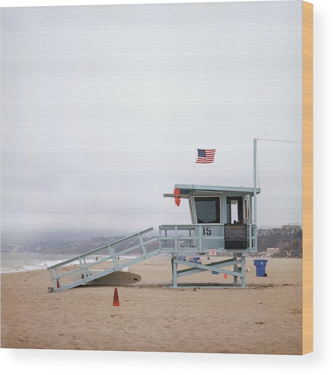 Tranquility Wood Print featuring the photograph Rescue Tower On The Sea Shore by Andriy Onufriyenko