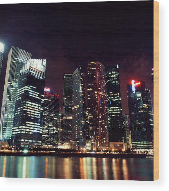 Tranquility Wood Print featuring the photograph Singapore Neon City Skyline by Jonathan Siegel