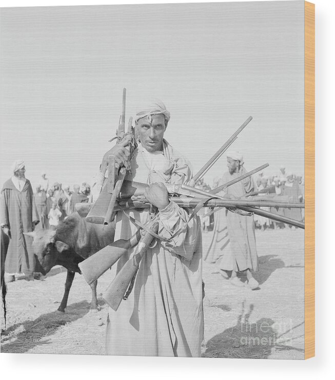Rifle Wood Print featuring the photograph Smaala Tribesman Surrendering Rifles by Bettmann