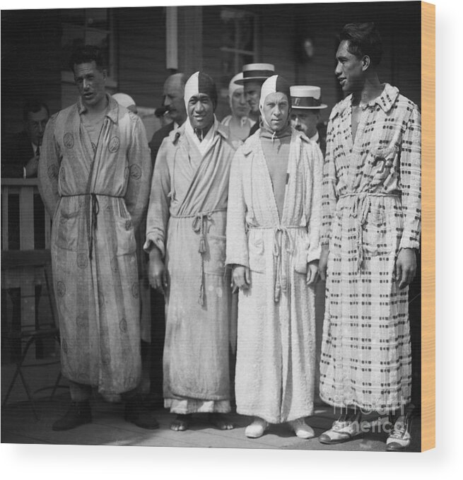 The Olympic Games Wood Print featuring the photograph Us Relay Swim Team In Robes by Bettmann
